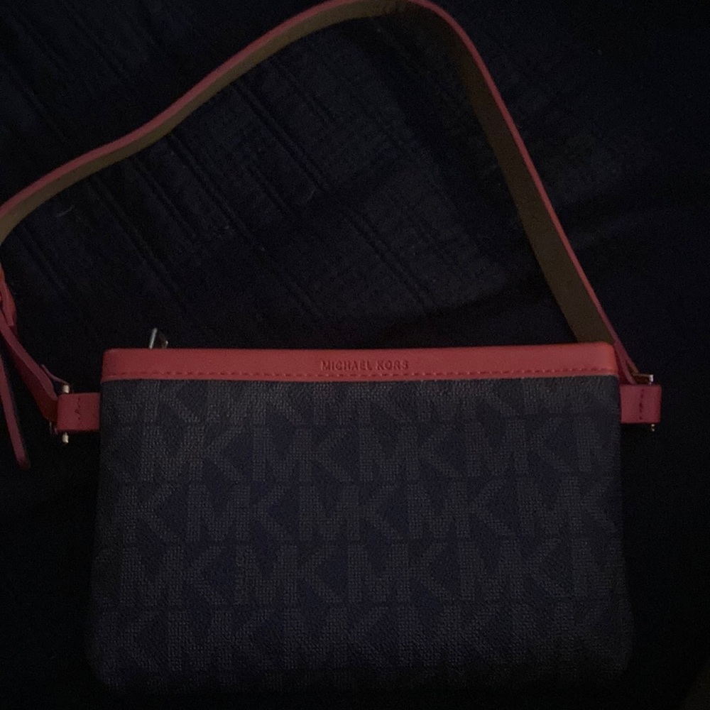 I am selling a new michale Have an blessed day -Braelyn your posh seller